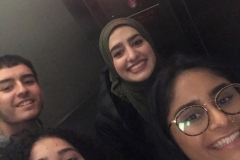 4_team_members_in_an_elevator