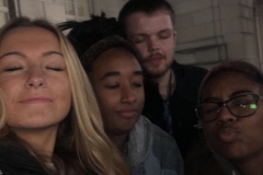 4_team_members_with_their_eyes_closed